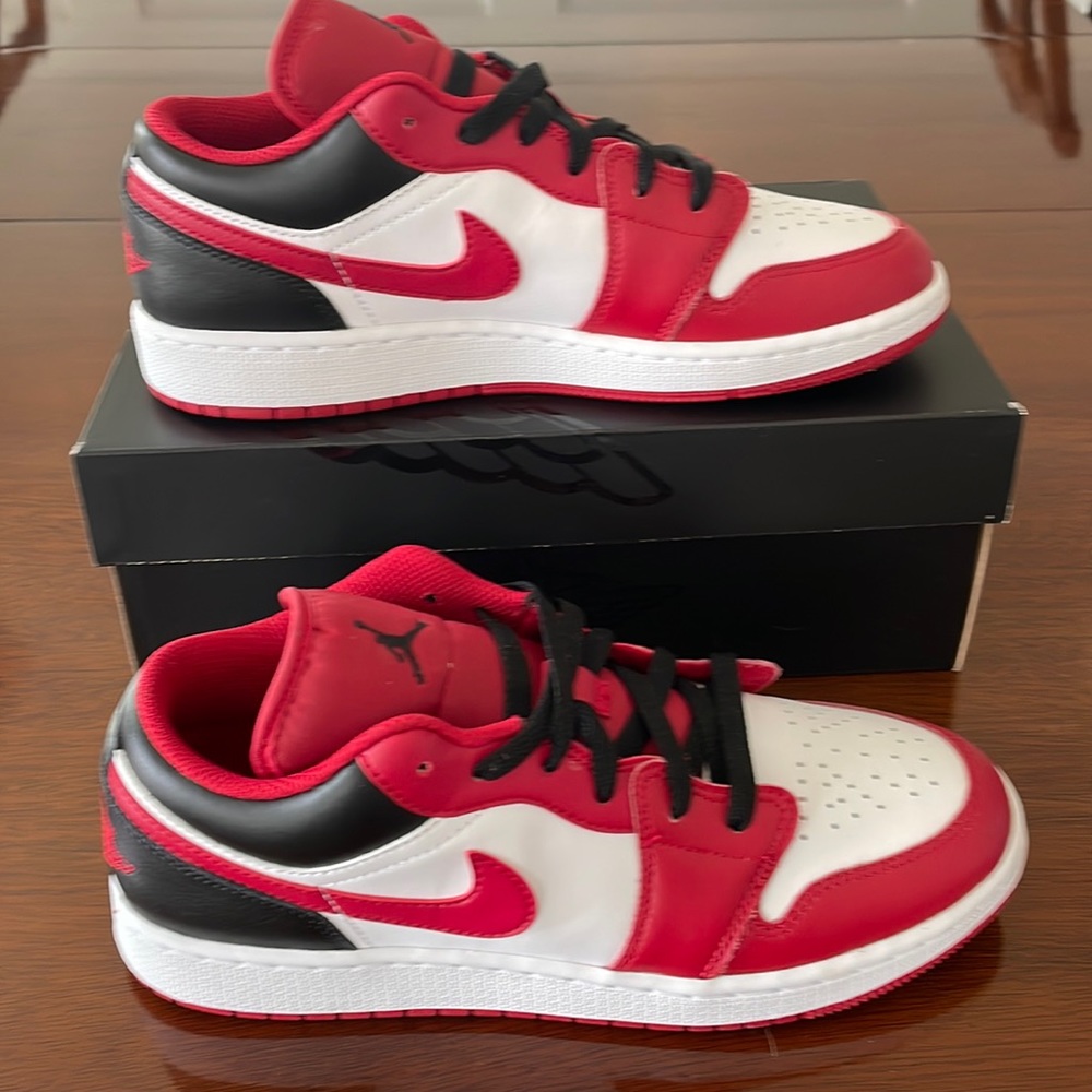 Nike Air Jordan’s red white and black